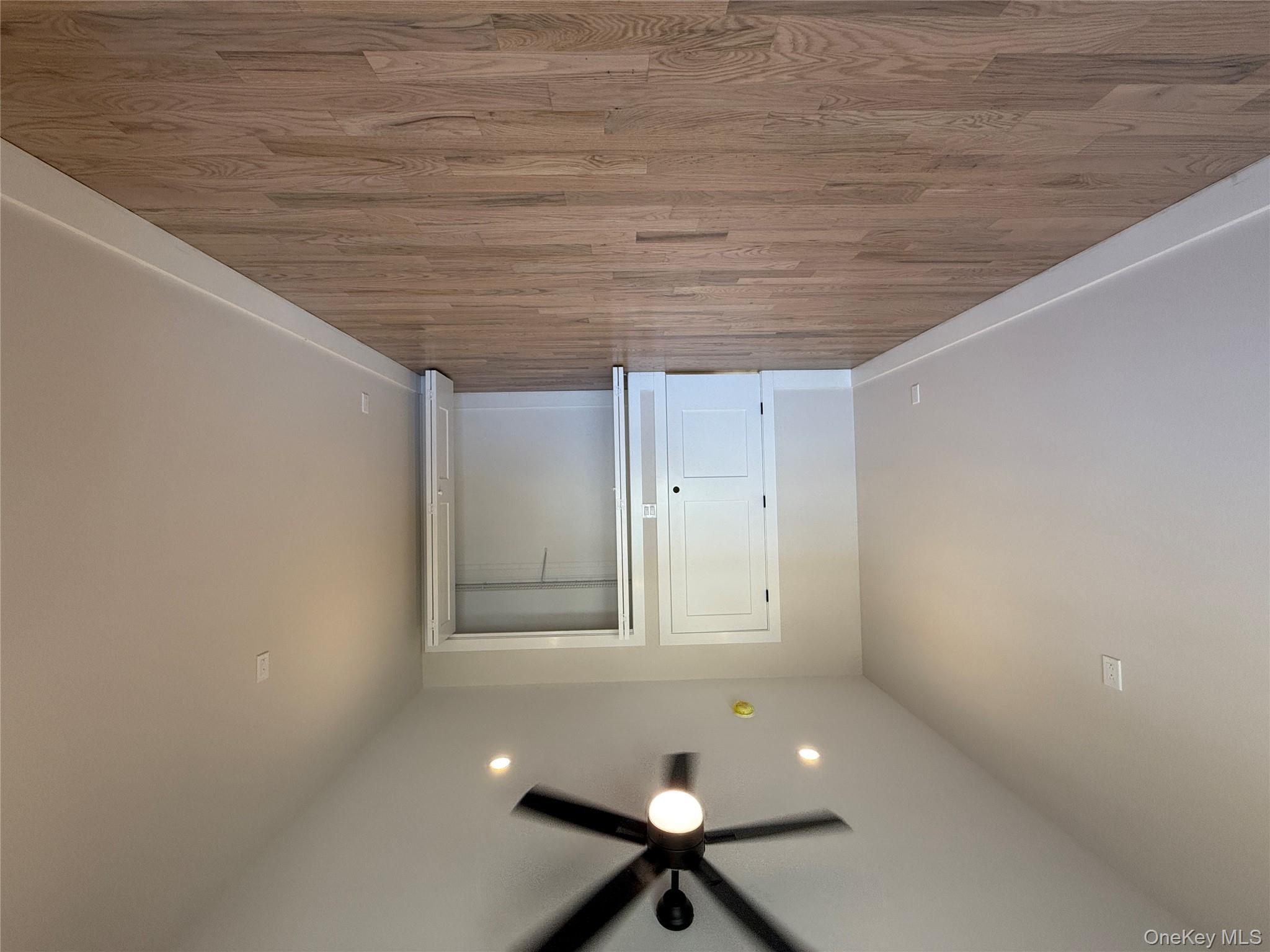 New Construction Rugby Drive Shirley, NY 11967 - Photo 10 of 17 wooden floor in an empty room