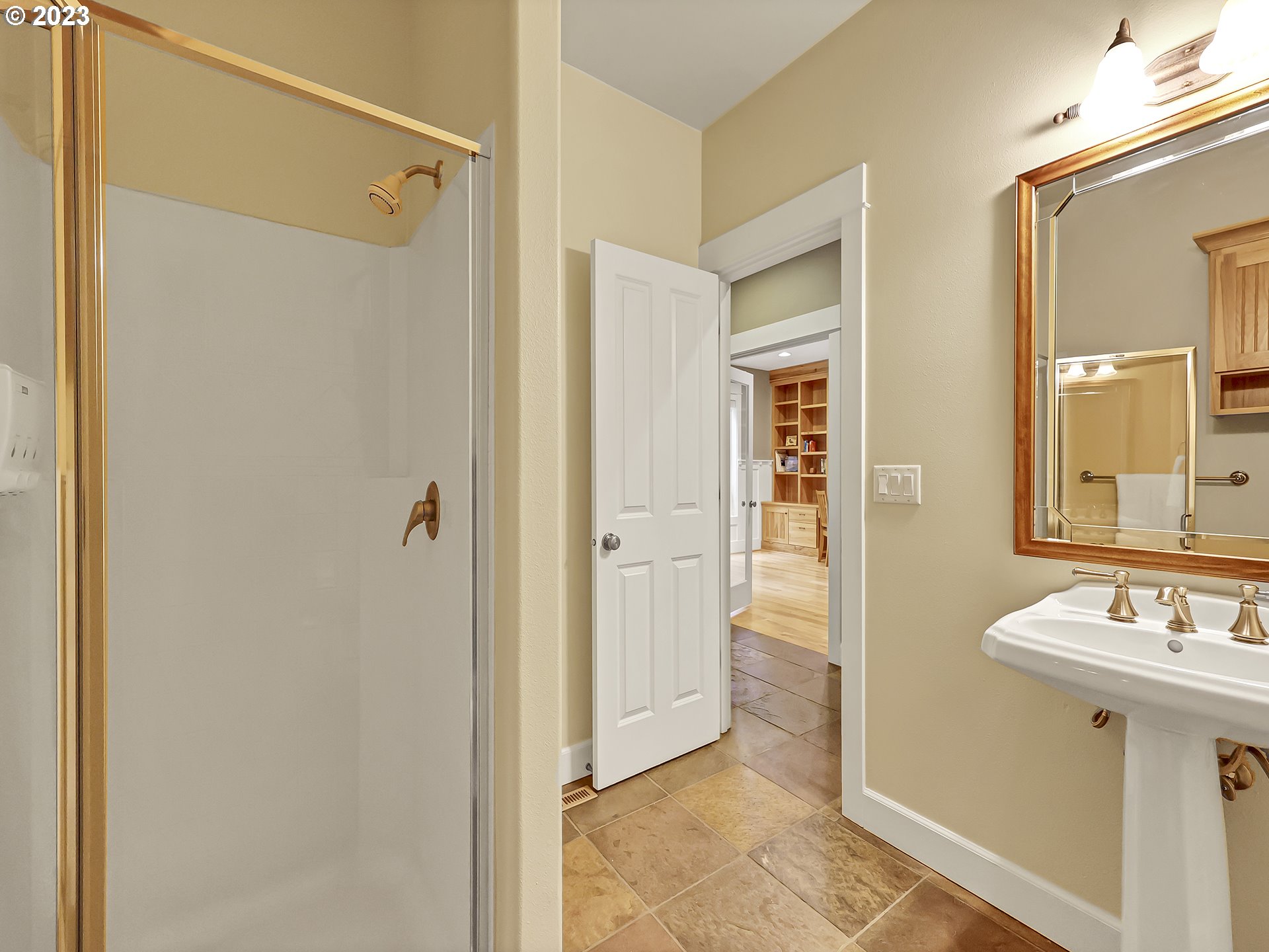 9965 Southwest Choctaw Street Tualatin, OR 97062 - Photo 21 of 25 a bathroom with a sink and a mirror