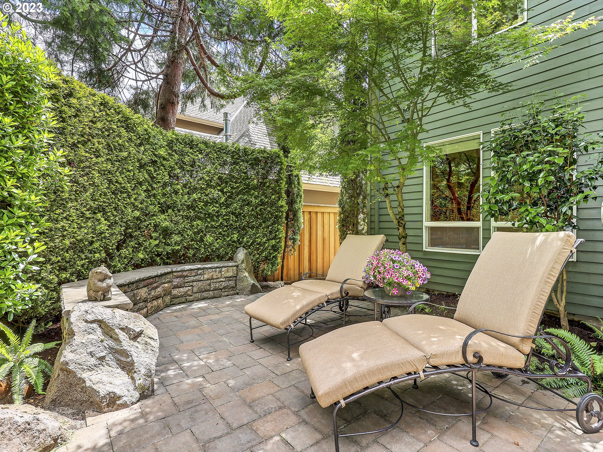 9965 Southwest Choctaw Street Tualatin, OR 97062 - Photo 24 of 25 a view of a patio with couple of chairs