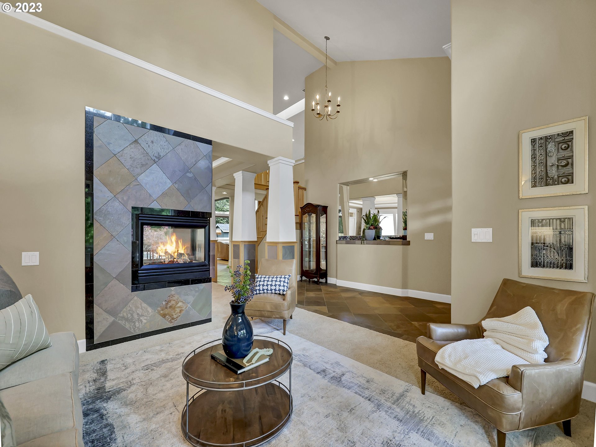 9965 Southwest Choctaw Street Tualatin, OR 97062 - Photo 4 of 25 a living room with furniture and a fireplace