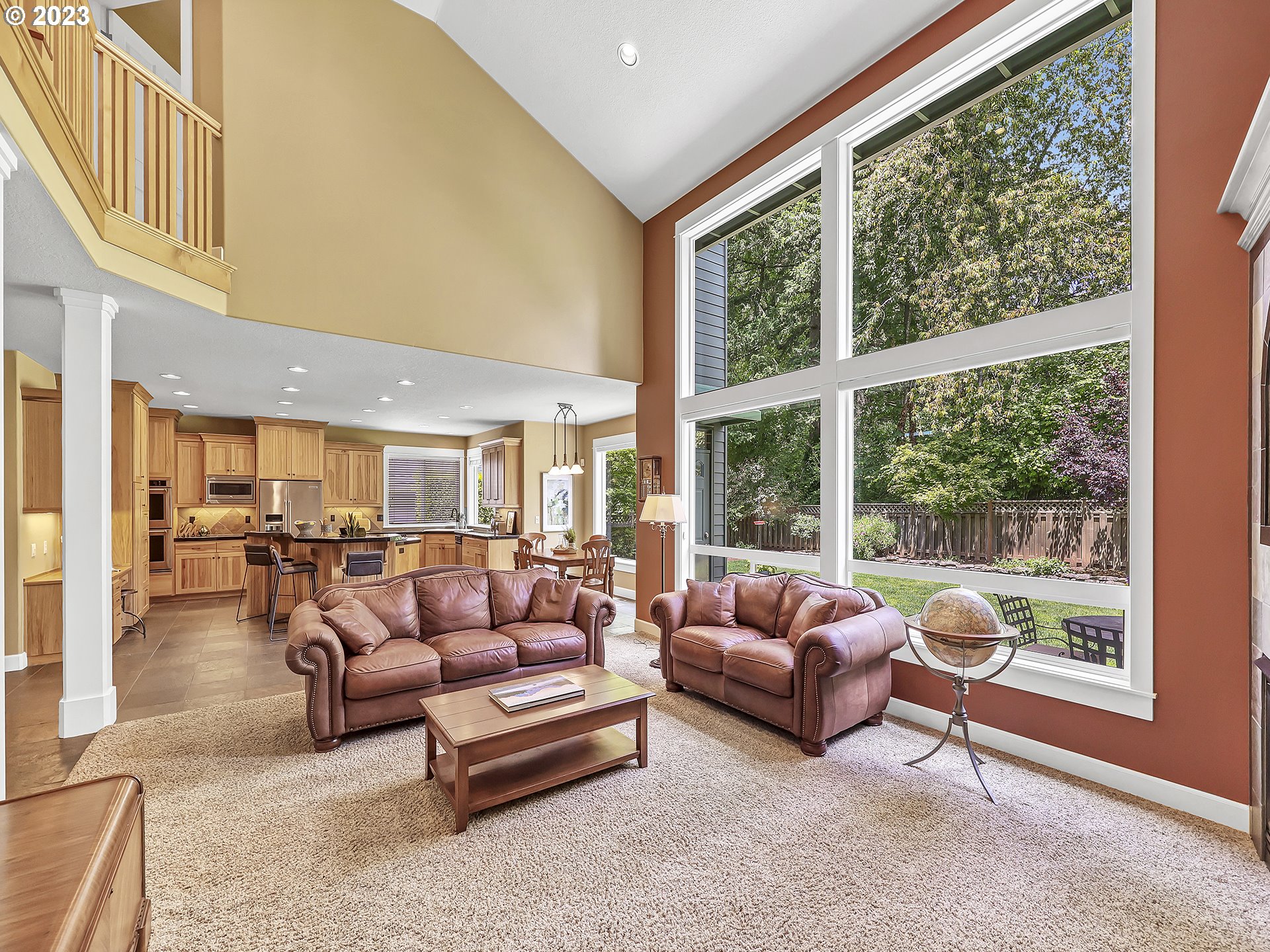 9965 Southwest Choctaw Street Tualatin, OR 97062 - Photo 10 of 25 a living room with furniture and a large window