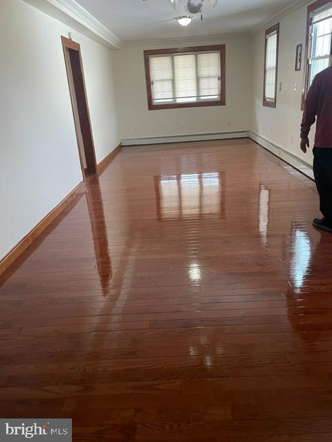 10 Middle Road Levittown, PA 19056 - Photo 2 of 25 a view of empty room with window and wooden floor