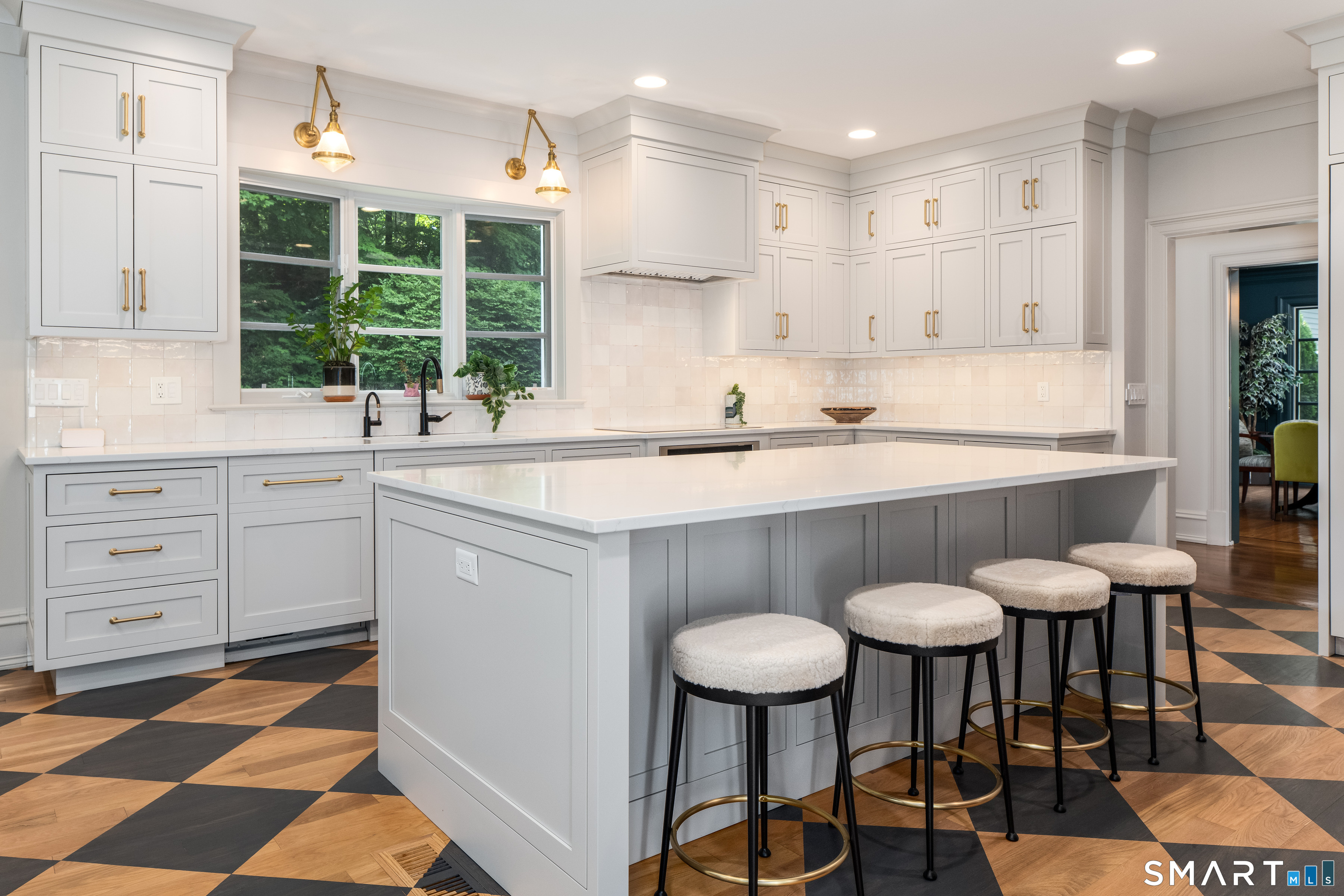 760 Smith Ridge Road New Canaan, CT 06840 - Photo 6 of 40 a kitchen with stainless steel appliances a sink and a refrigerator