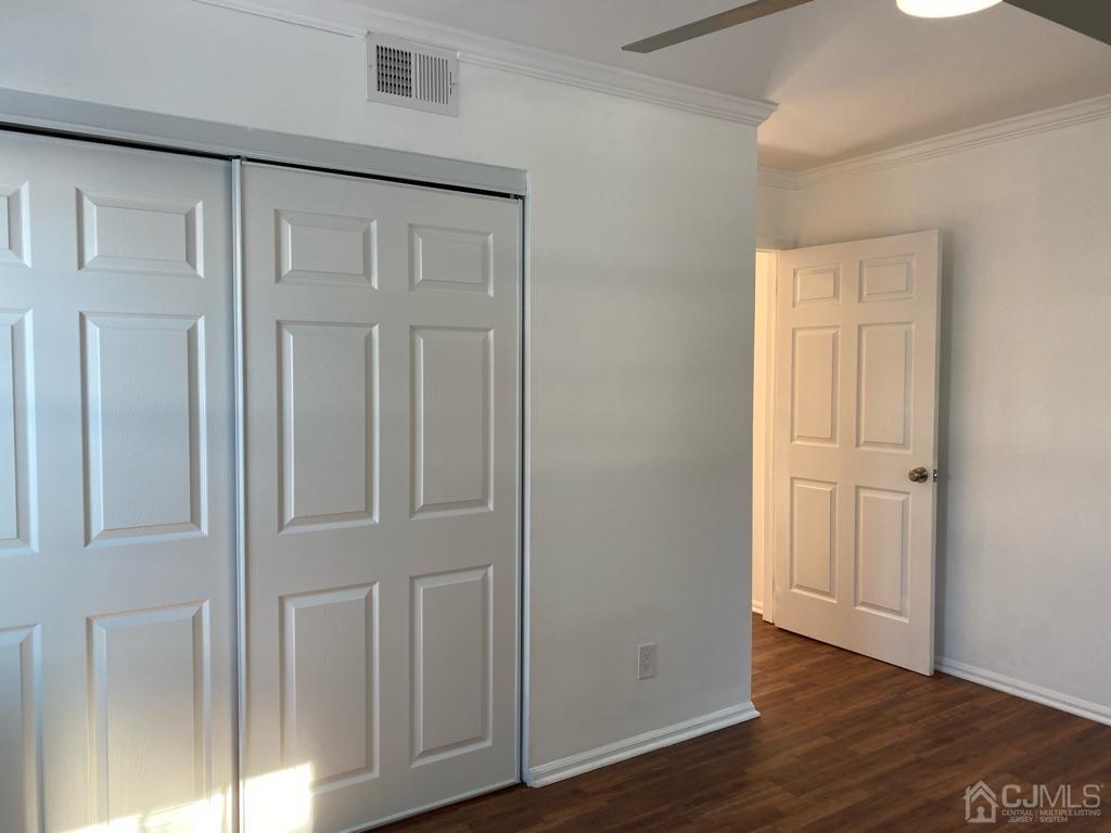 A Zacatin Road Freehold, NJ 07728 - Photo 17 of 25 an empty room with wooden floor