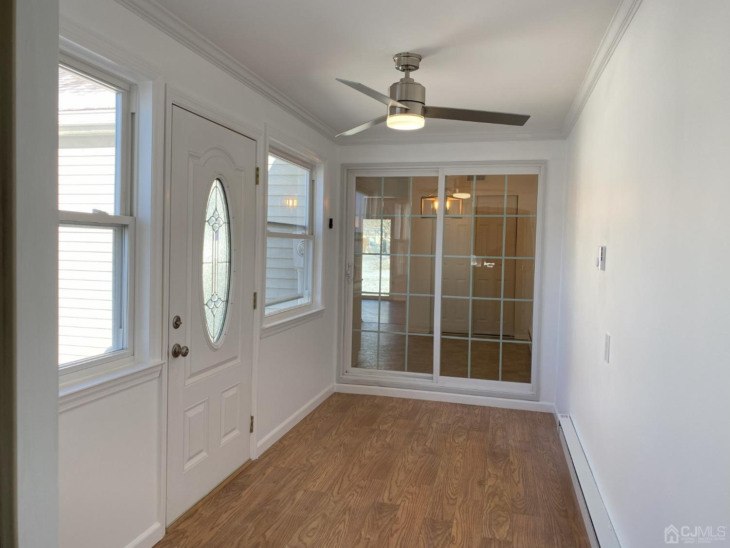 A Zacatin Road Freehold, NJ 07728 - Photo 25 of 25 an empty room with windows and closet