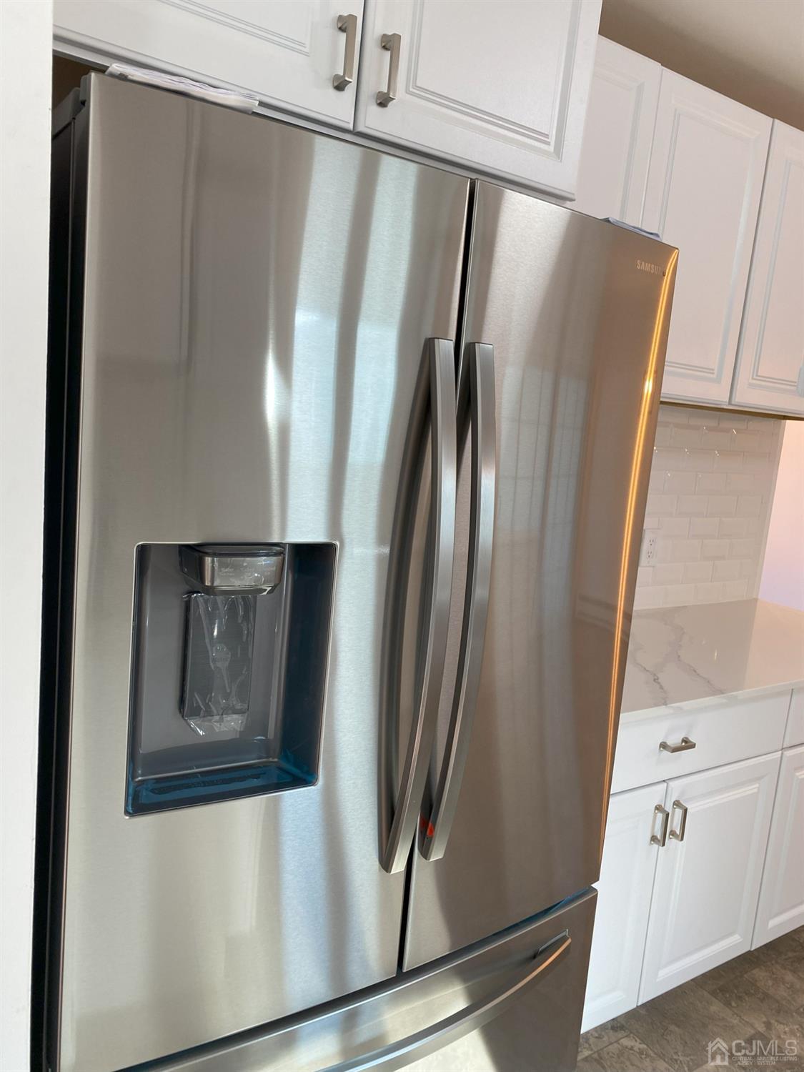 A Zacatin Road Freehold, NJ 07728 - Photo 7 of 25 a view of a refrigerator in kitchen