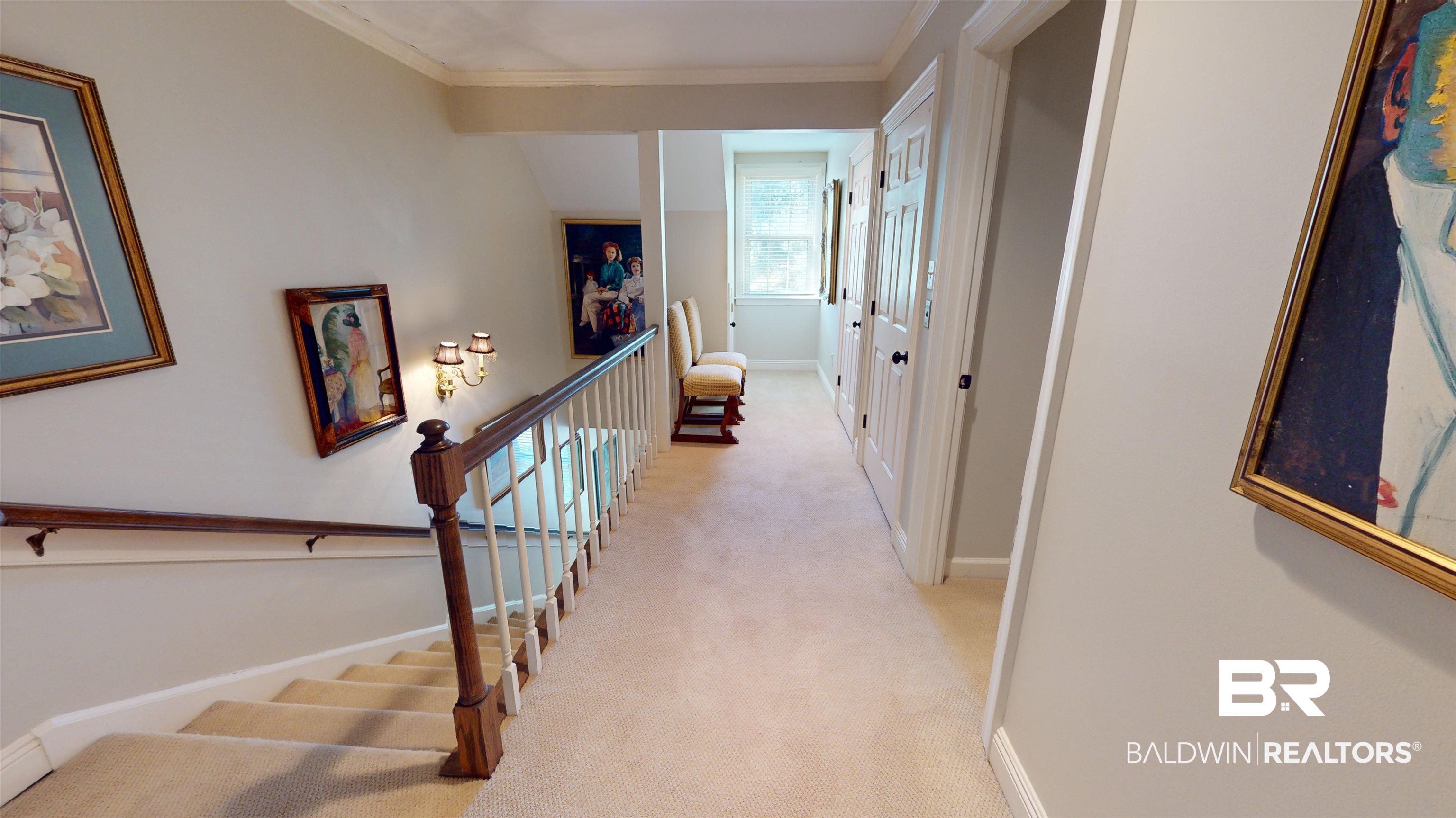 2404 Spring Hill Avenue, Unit 115 Mobile, AL 36607 - Photo 23 of 38 Stairway featuring carpet and crown molding