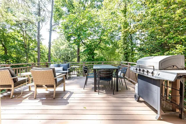 a view of roof deck with patio
