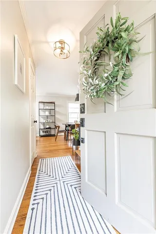 a view of balcony with wooden floor