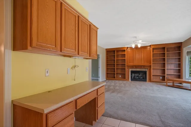 a view of an empty room with a bathroom