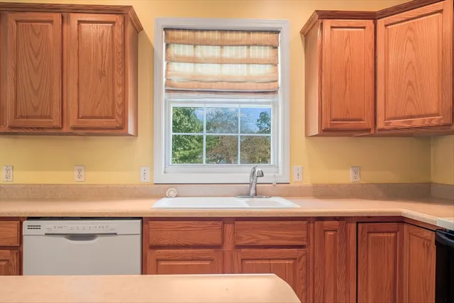 a view of a hallway with a chandelier