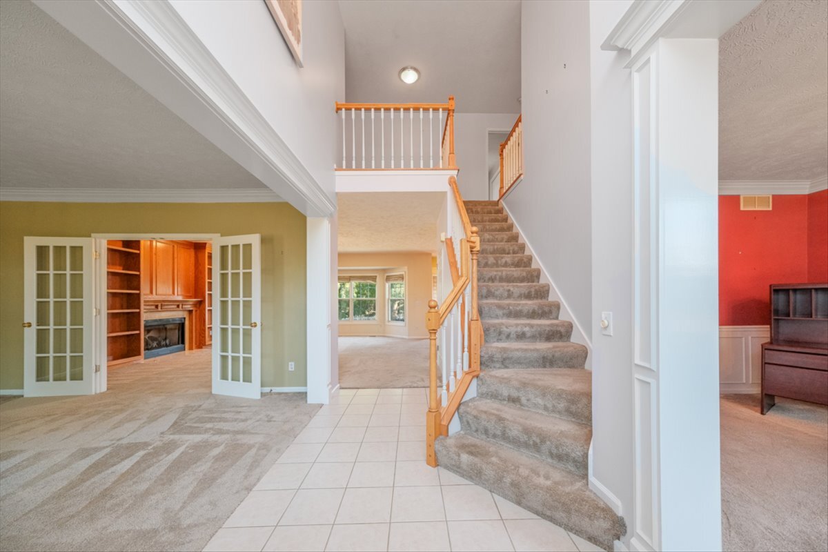 4406 Crossgate Drive Champaign, IL 61822 - Photo 2 of 64 a view of entryway and hall with wooden floor
