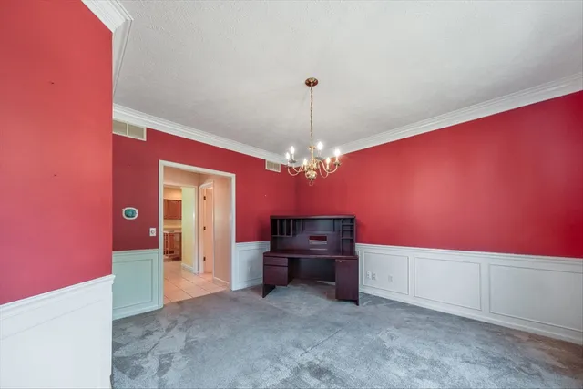 a view of a room that has a window in it