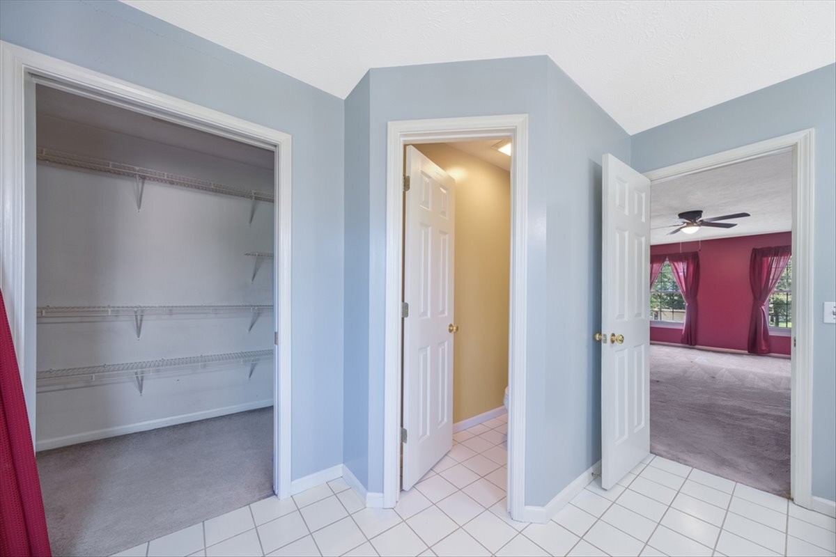 4406 Crossgate Drive Champaign, IL 61822 - Photo 38 of 64 a view of a hallway with closet and a bathroom