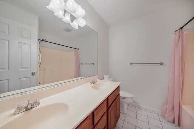 a bathroom with a sink and a shower