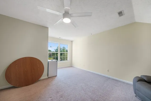 a front view of house with outdoor seating