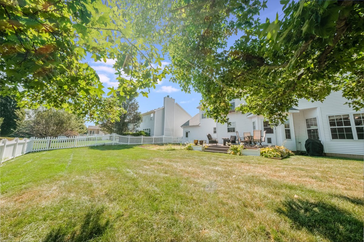4406 Crossgate Drive Champaign, IL 61822 - Photo 59 of 64 a view of a house with swimming pool and sitting area