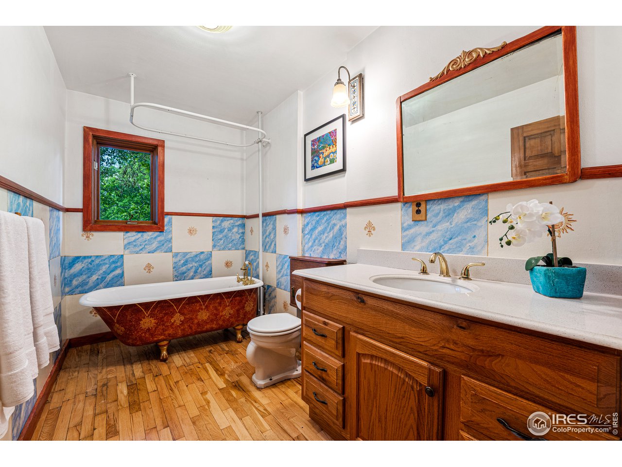 4731 Jay Road Boulder, CO 80301 - Photo 20 of 33 a bathroom with a sink a toilet and mirror