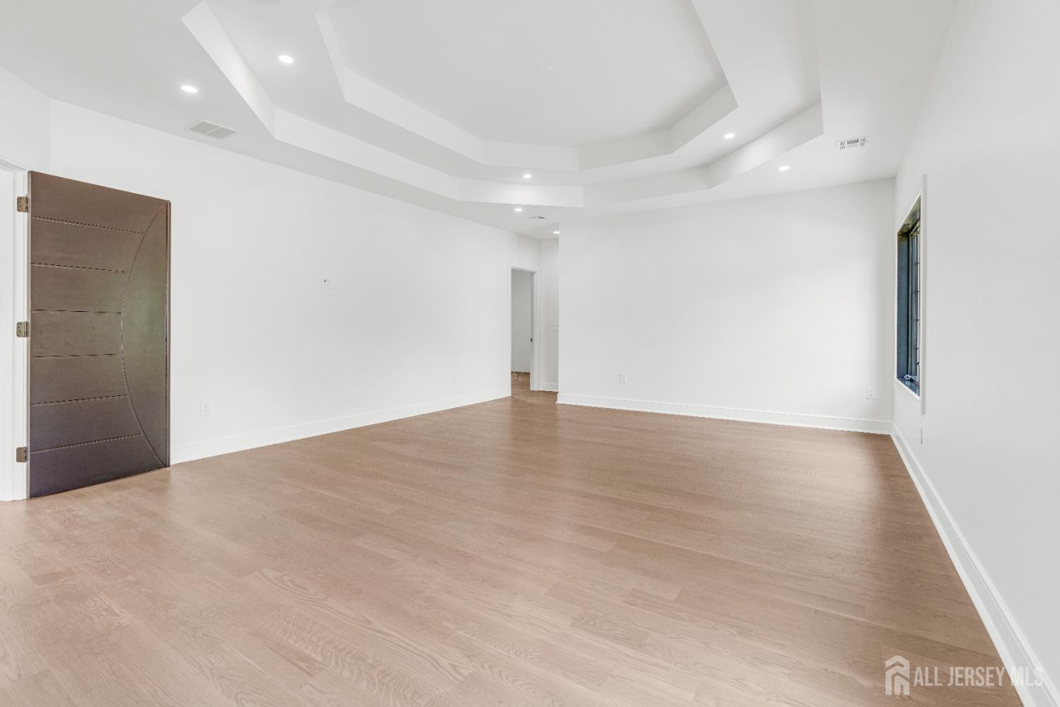 28 Harding Avenue Edison, NJ 08820 - Photo 24 of 62 a view of a big room with wooden floor