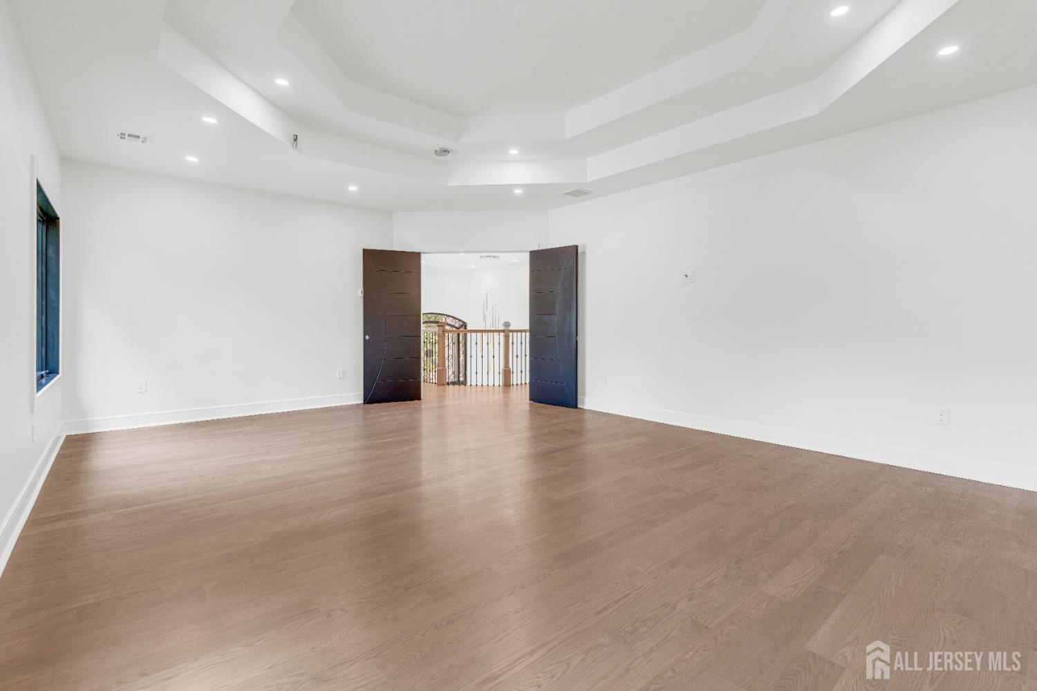 28 Harding Avenue Edison, NJ 08820 - Photo 25 of 62 a view of a room with wooden floor