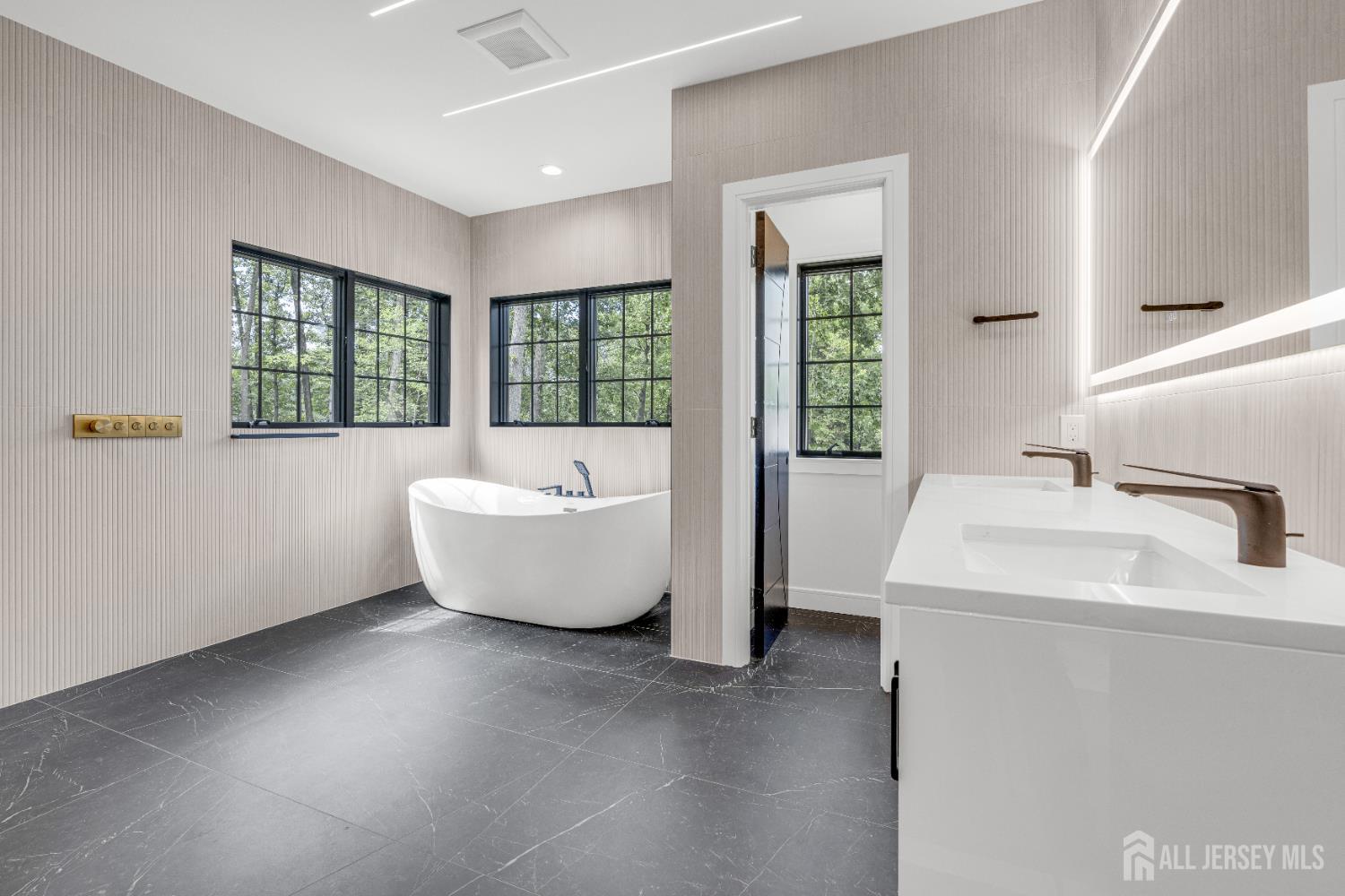 28 Harding Avenue Edison, NJ 08820 - Photo 26 of 62 a spacious bathroom with sink and mirror
