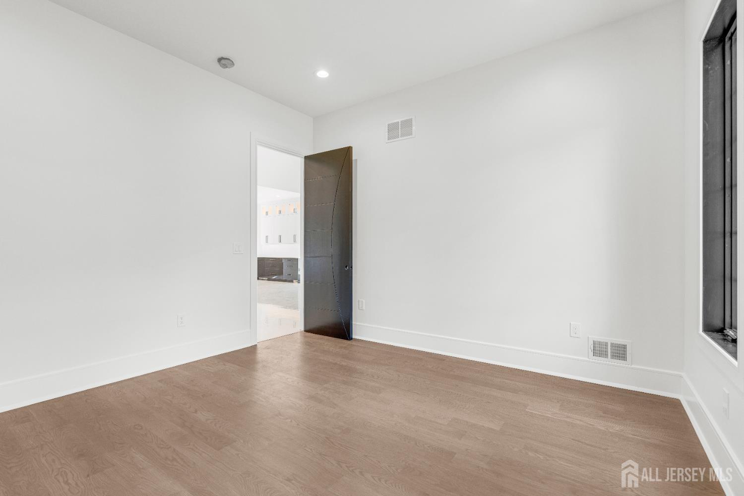 28 Harding Avenue Edison, NJ 08820 - Photo 43 of 62 a view of an empty room