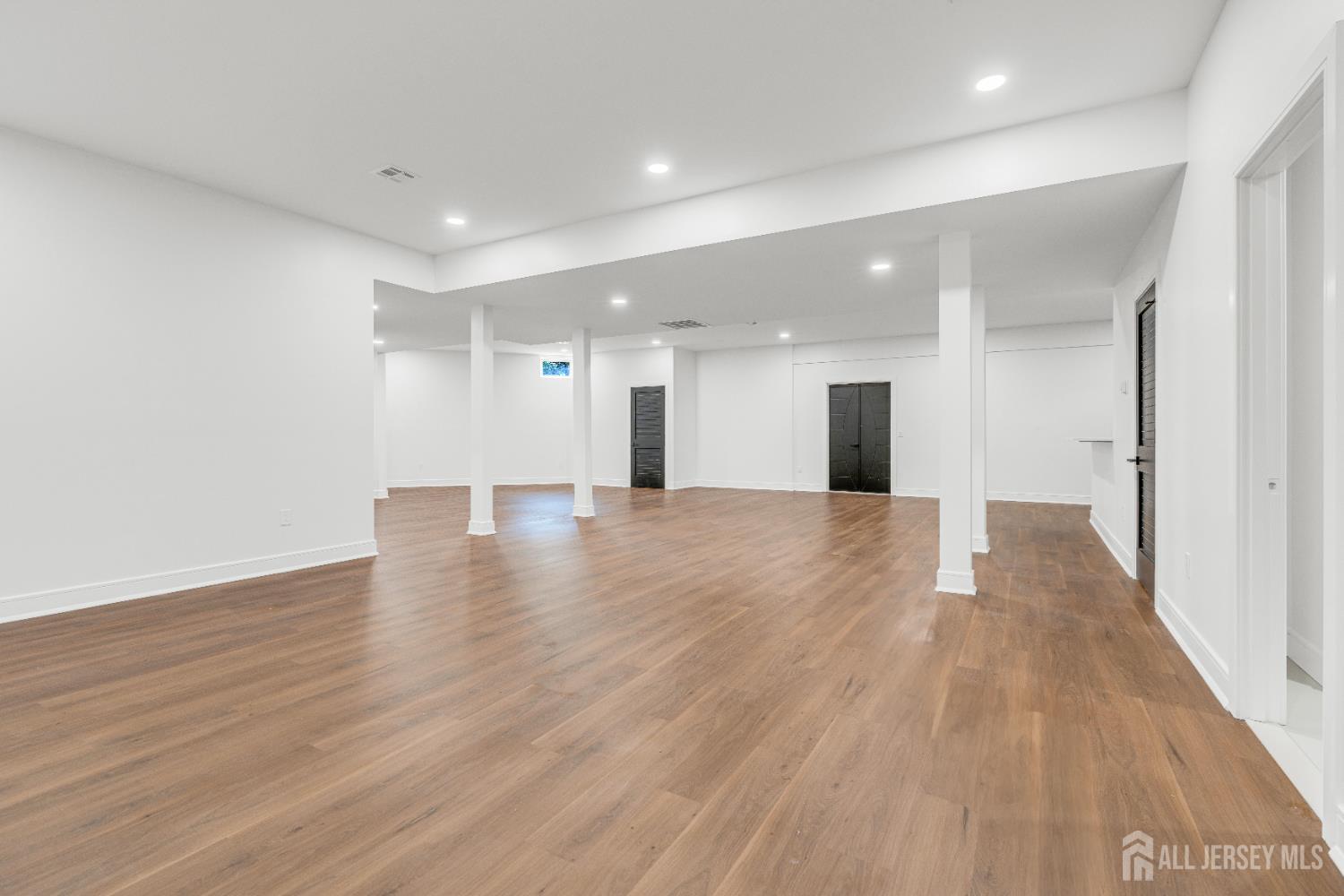 28 Harding Avenue Edison, NJ 08820 - Photo 47 of 62 a view of a hallway with wooden floor
