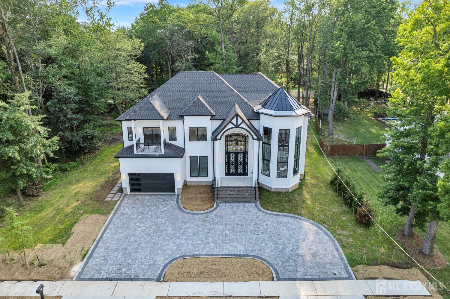 28 Harding Avenue Edison, NJ 08820 - Photo 5 of 62 a aerial view of a house with yard patio and green space