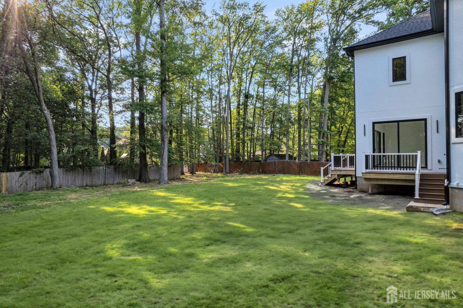 28 Harding Avenue Edison, NJ 08820 - Photo 60 of 62 a view of a backyard with a small cabin