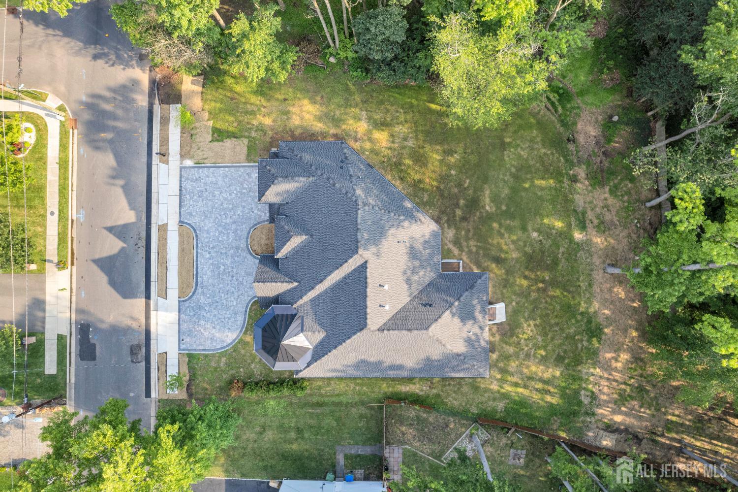 28 Harding Avenue Edison, NJ 08820 - Photo 61 of 62 an aerial view of residential house with outdoor space and trees