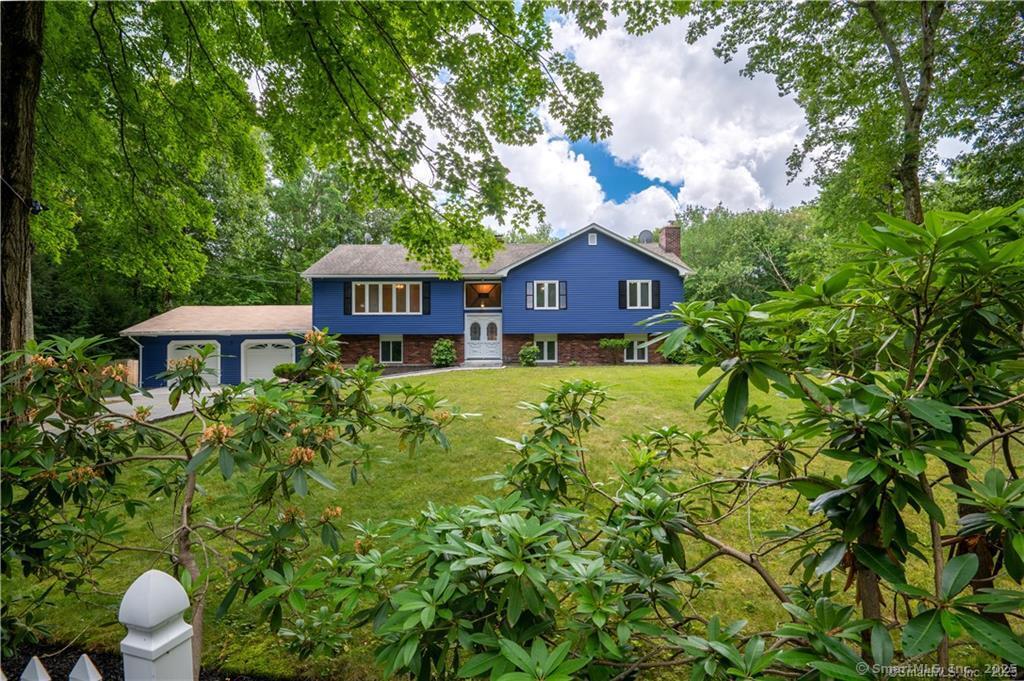 34 Lloyd Street Hamden, CT 06518 - Photo 5 of 7 a house view with a garden space