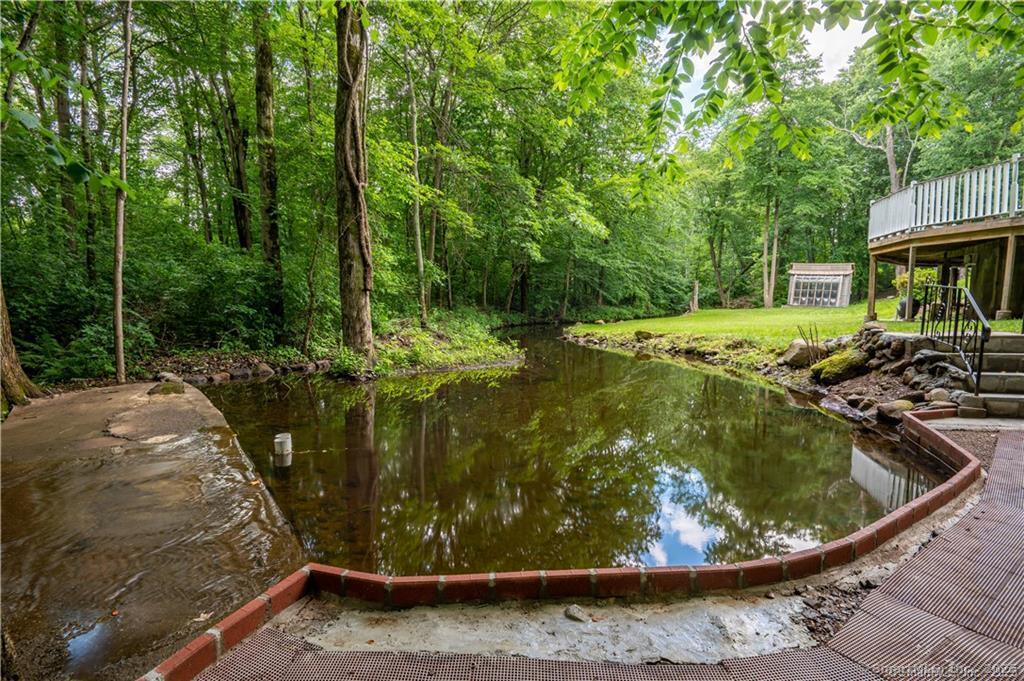 34 Lloyd Street Hamden, CT 06518 - Photo 7 of 7 a view of a wooden deck with chairs