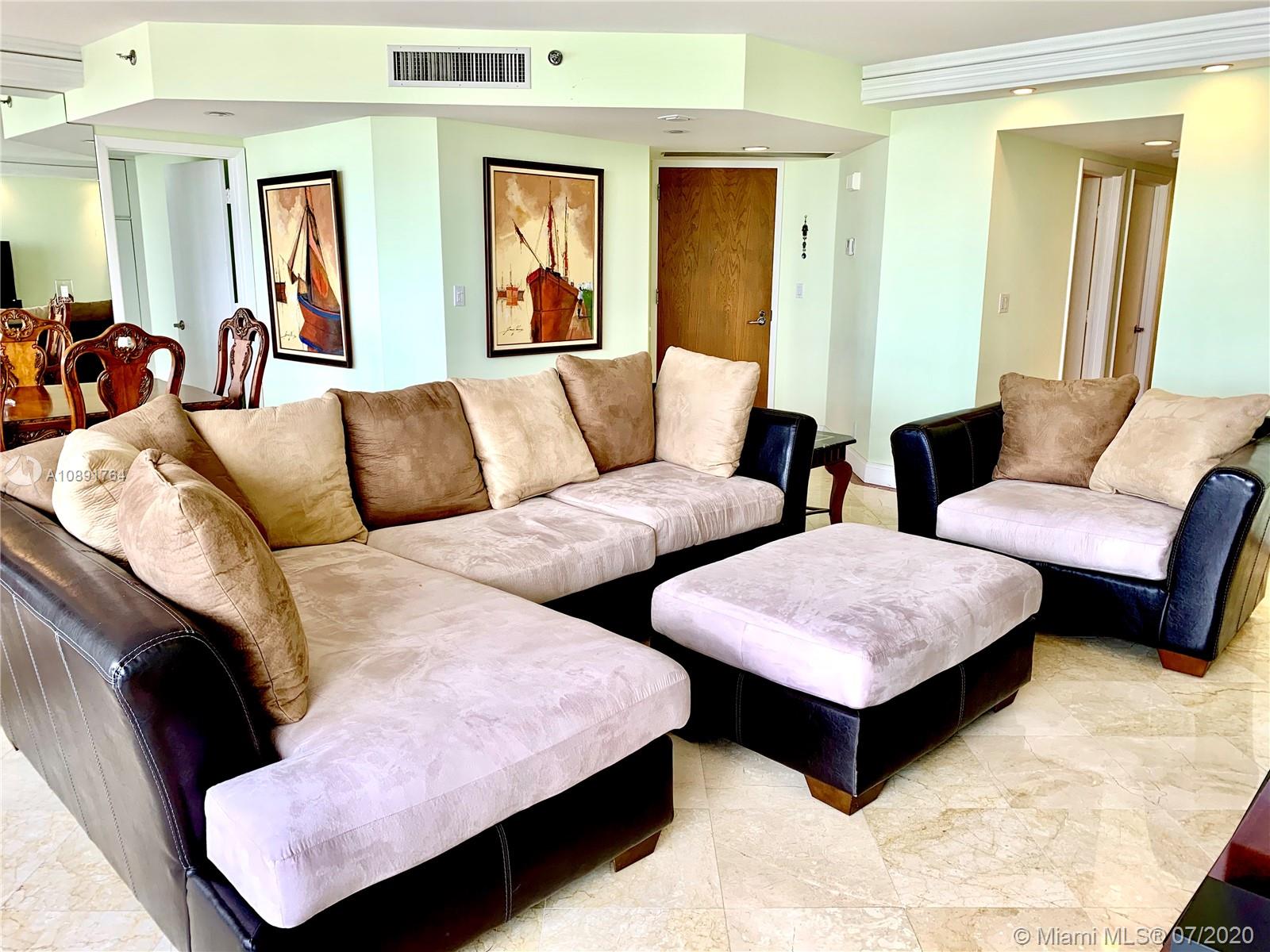 Williams Island Aventura, FL 33160 - Photo 4 of 23 a living room with furniture and wooden floor