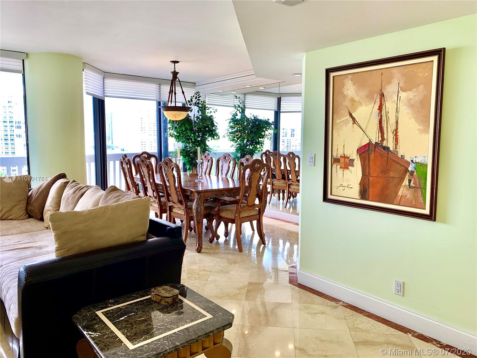 Williams Island Aventura, FL 33160 - Photo 8 of 23 a living room with furniture and a window