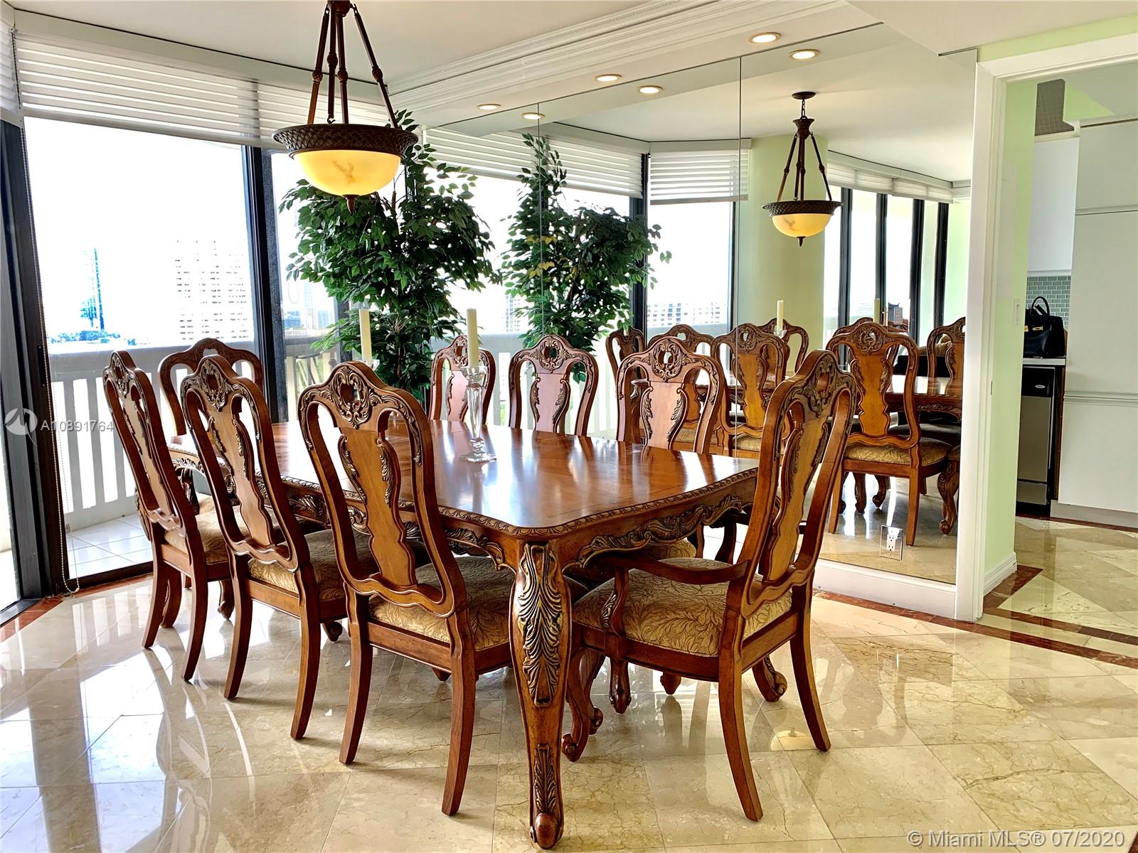 Williams Island Aventura, FL 33160 - Photo 10 of 23 a dining room with furniture and window