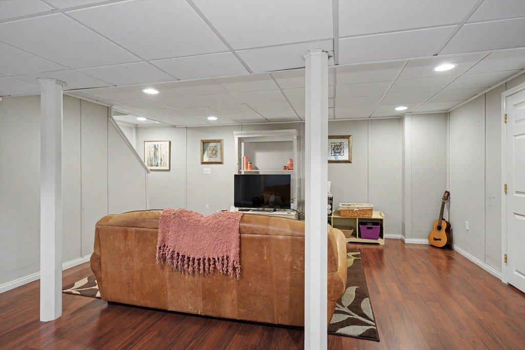 15 Lanthorn Road Northborough, MA 01532 - Photo 27 of 37 a living room with furniture and a flat screen tv