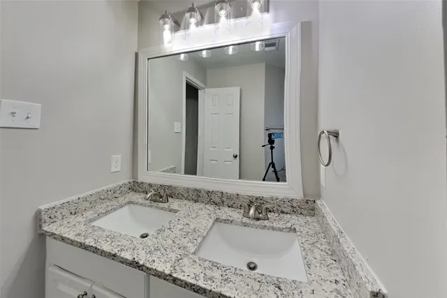 a bathroom with a toilet bathtub and shower