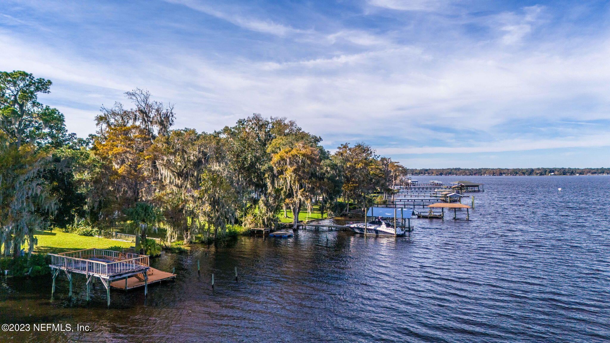 42 Harmony Hall Road Middleburg, FL 32068 - Photo 3 of 70 a view of a lake with outdoor seating