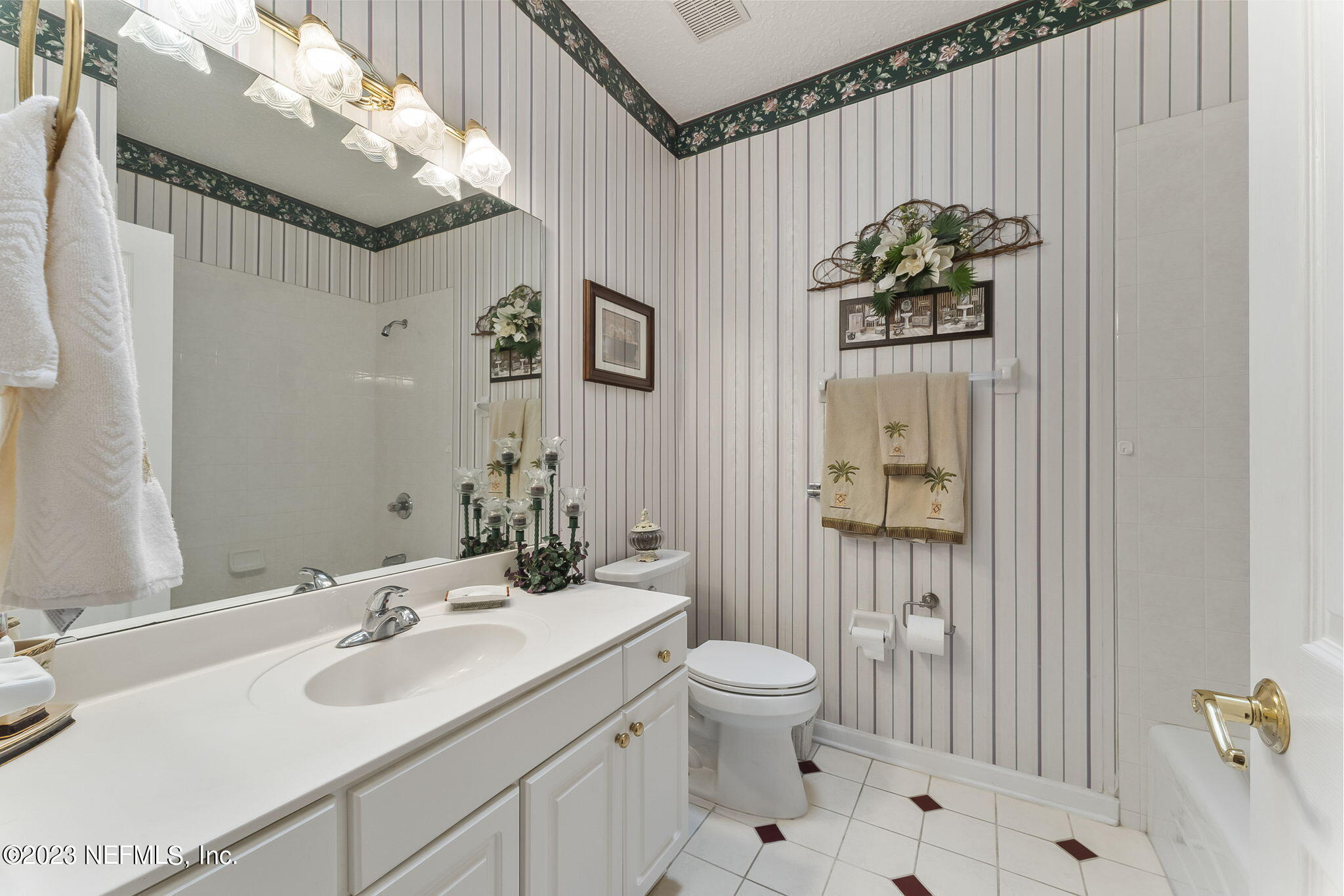 42 Harmony Hall Road Middleburg, FL 32068 - Photo 33 of 70 a bathroom with a sink toilet and shower