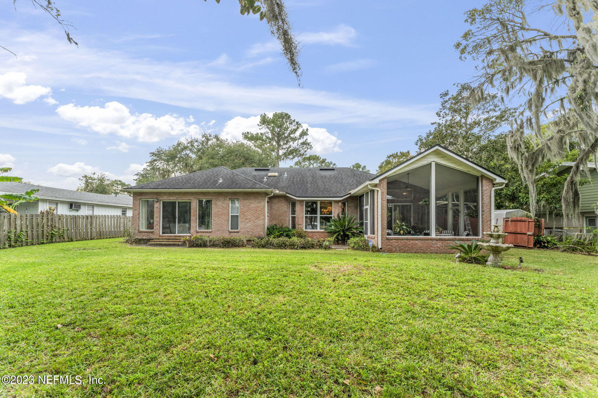 42 Harmony Hall Road Middleburg, FL 32068 - Photo 40 of 70 a front view of a house with a garden