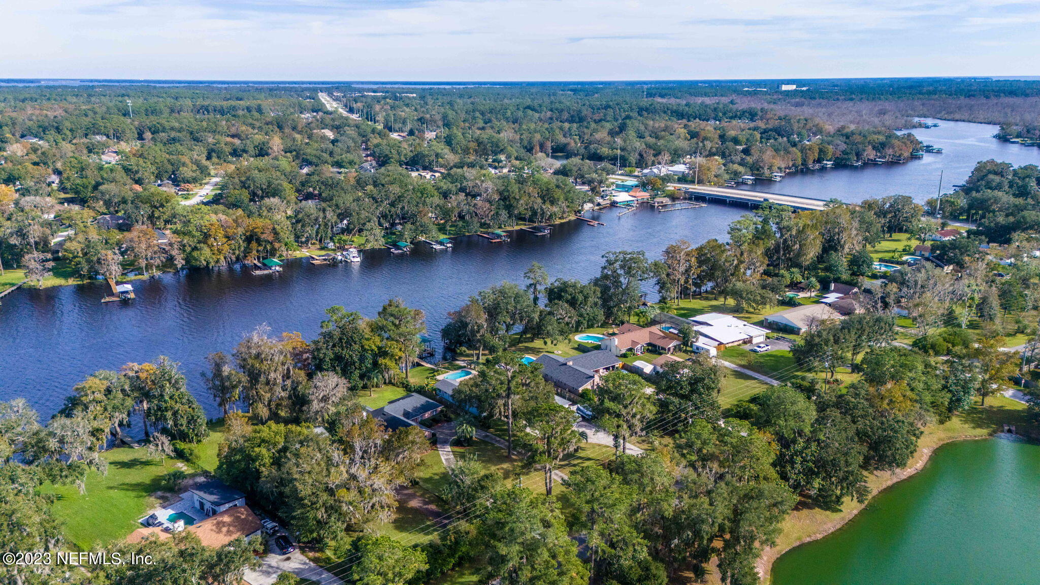 42 Harmony Hall Road Middleburg, FL 32068 - Photo 50 of 70 an aerial view of a houses with a yard and lake view