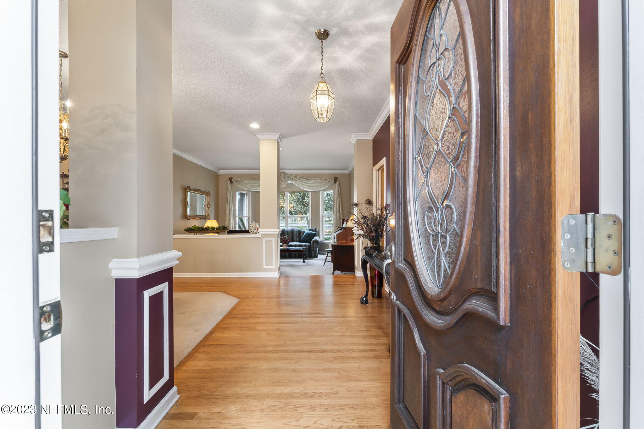 42 Harmony Hall Road Middleburg, FL 32068 - Photo 5 of 70 a view of a hallway with furniture and entryway