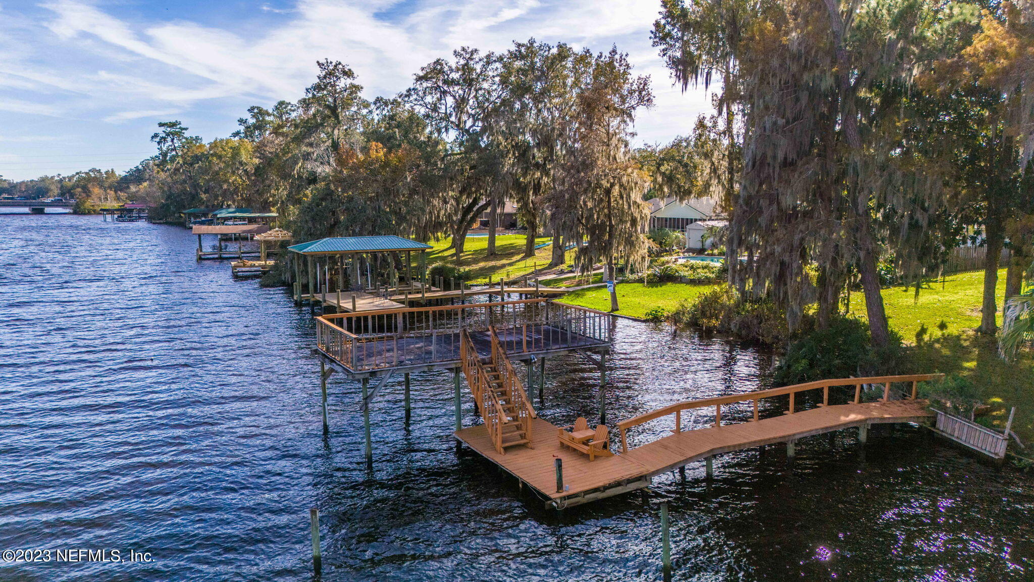 42 Harmony Hall Road Middleburg, FL 32068 - Photo 60 of 70 a view of a wooden chairs with a small yard