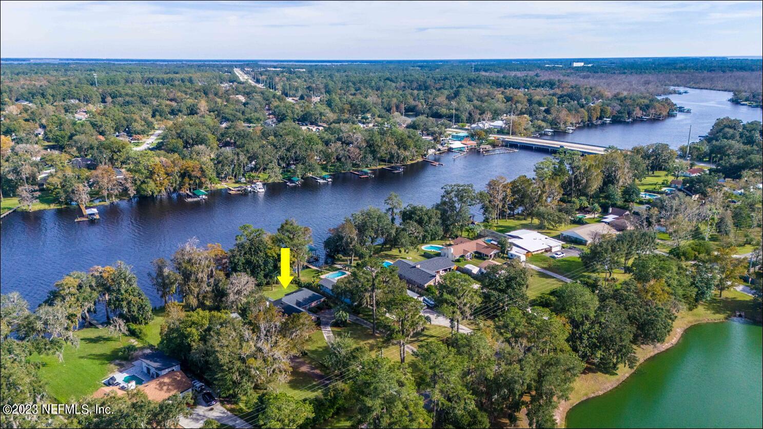 42 Harmony Hall Road Middleburg, FL 32068 - Photo 70 of 70 an aerial view of a houses with a yard and lake view