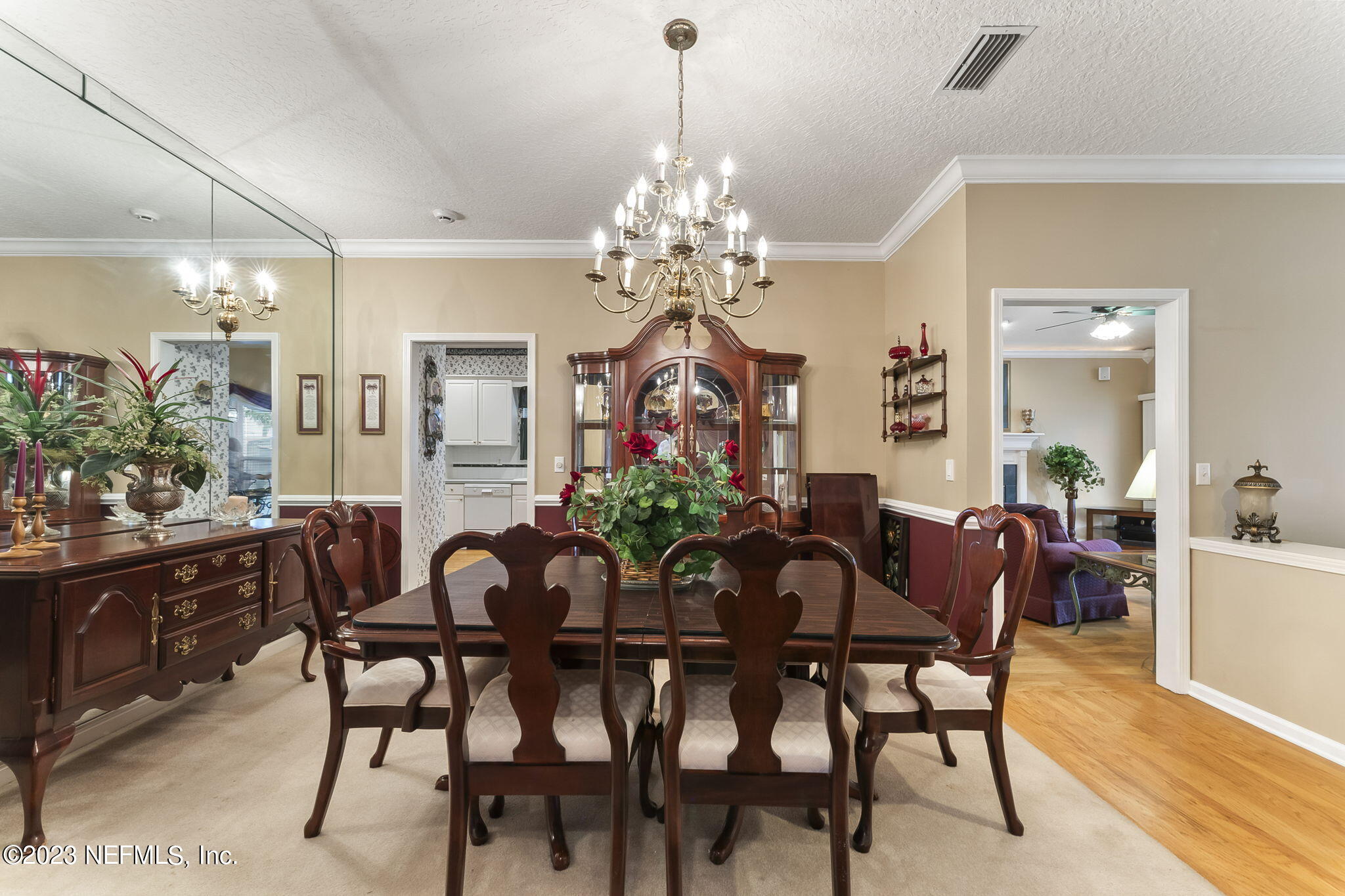 42 Harmony Hall Road Middleburg, FL 32068 - Photo 8 of 70 a view of a dining room with furniture and chandelier