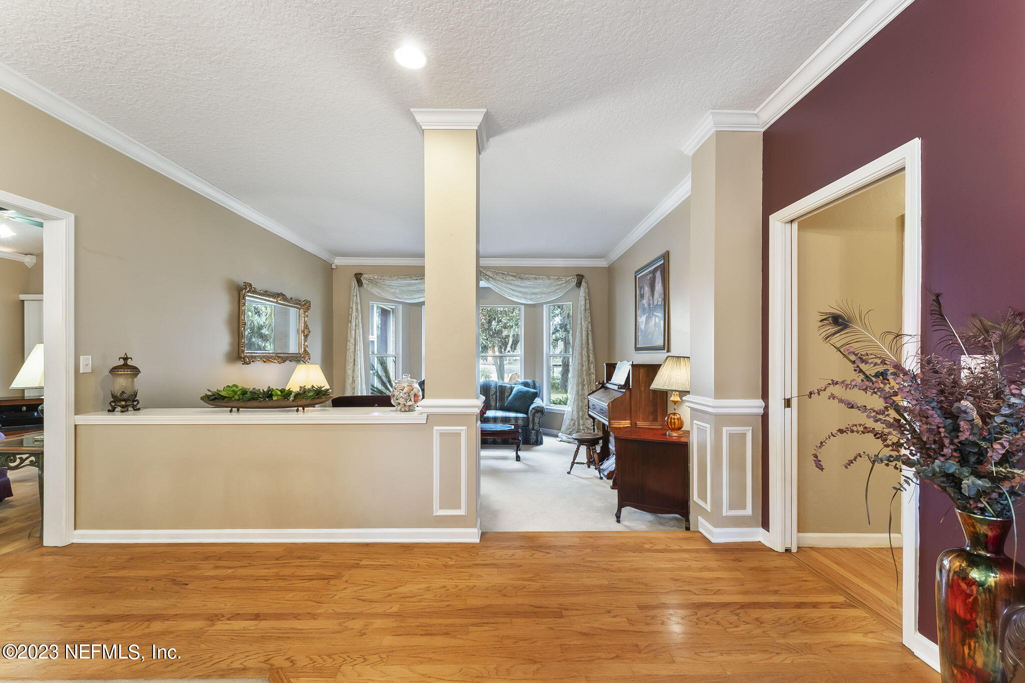 42 Harmony Hall Road Middleburg, FL 32068 - Photo 10 of 70 a living room with furniture and a large window