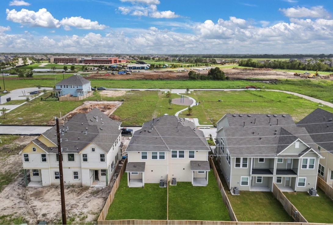 5234 Capricorn Way Manvel, TX 77578 - Photo 23 of 25 a view of a city with an ocean view