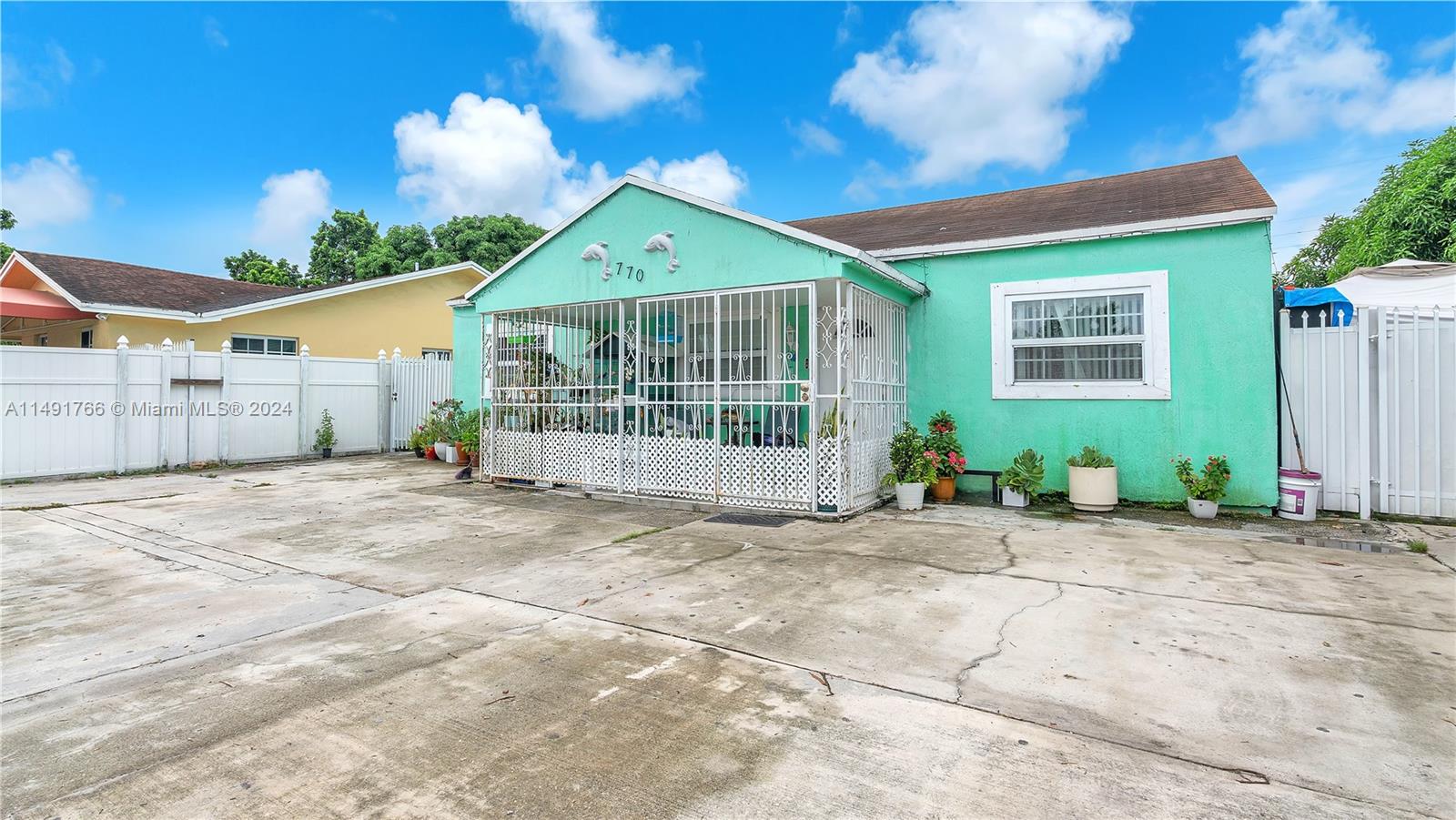 770 Southeast 4th Place Hialeah, FL 33010 - Photo 3 of 19 a view of backyard of house