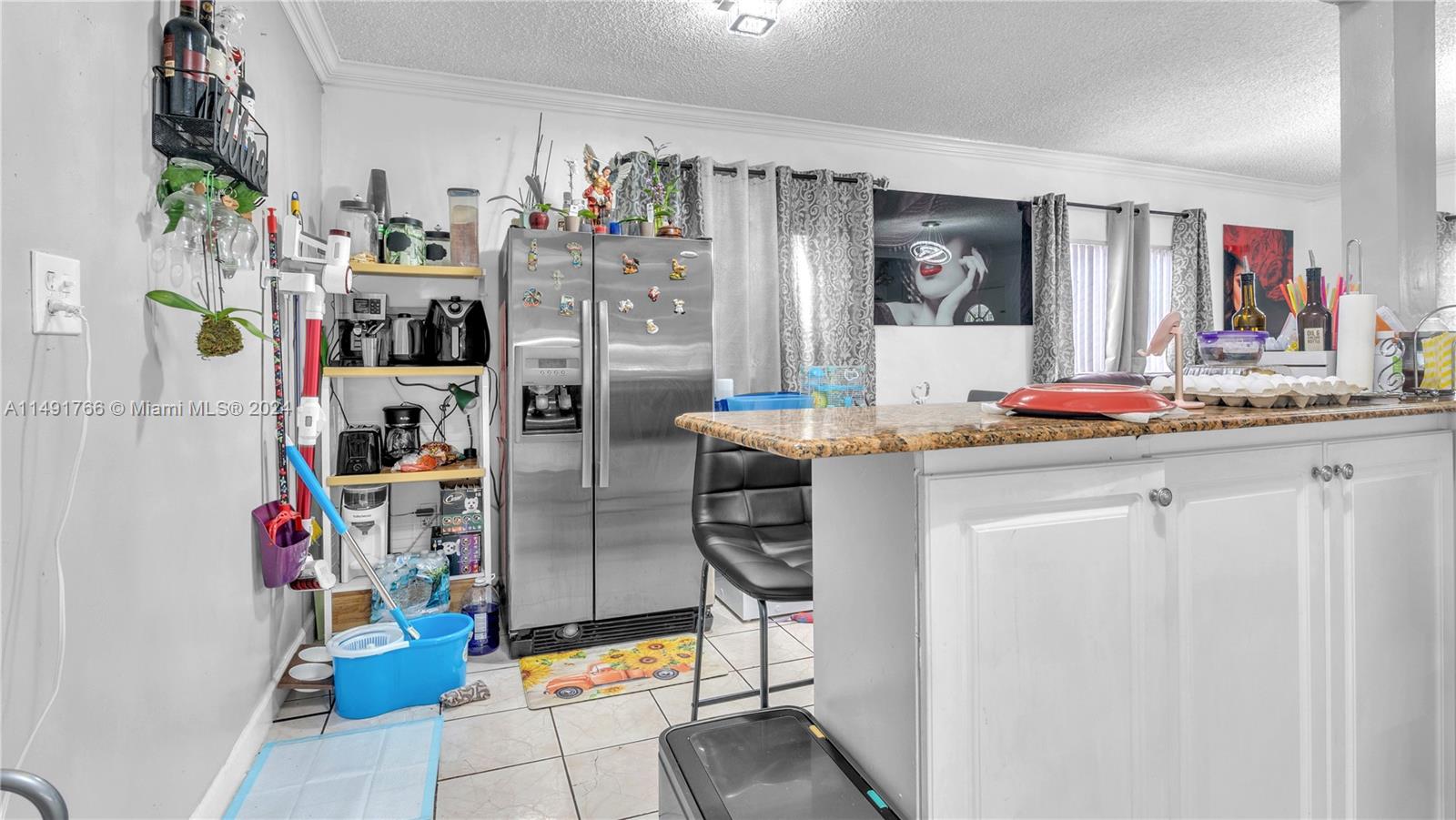 770 Southeast 4th Place Hialeah, FL 33010 - Photo 6 of 19 a room with storage and utility