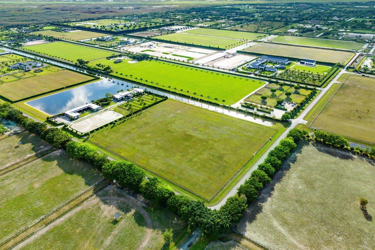 5111 Lasso Way Wellington, FL 33449 - Photo 8 of 12 a view of an outdoor space and a lake view